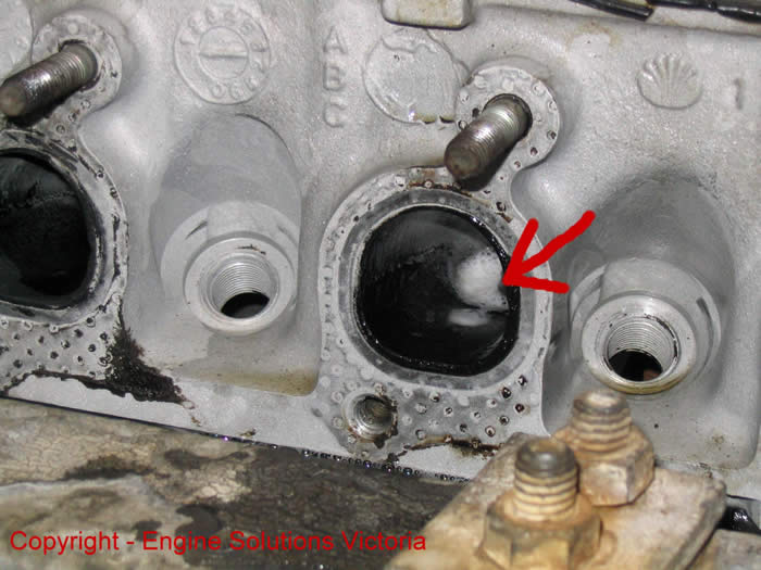 Pin hole revealed in exhaust port